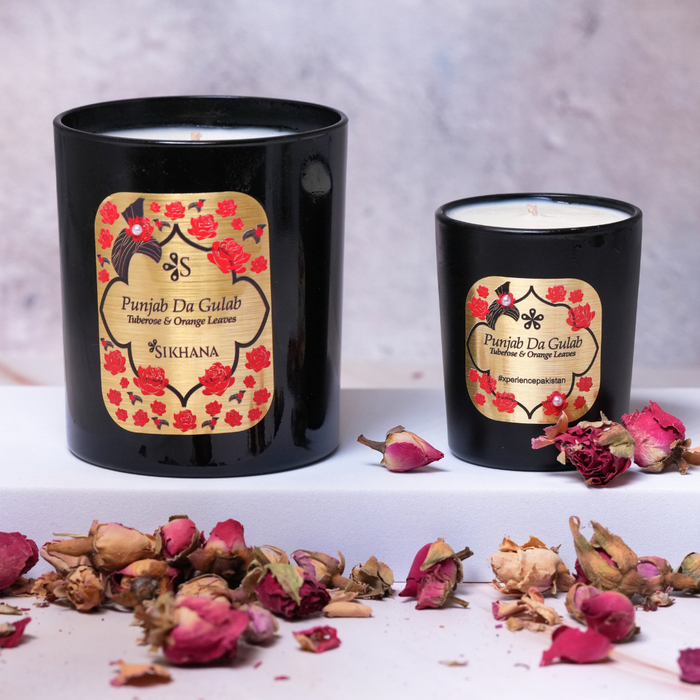Punjab Da Gulab scented candles by Sikhana, with rose petals