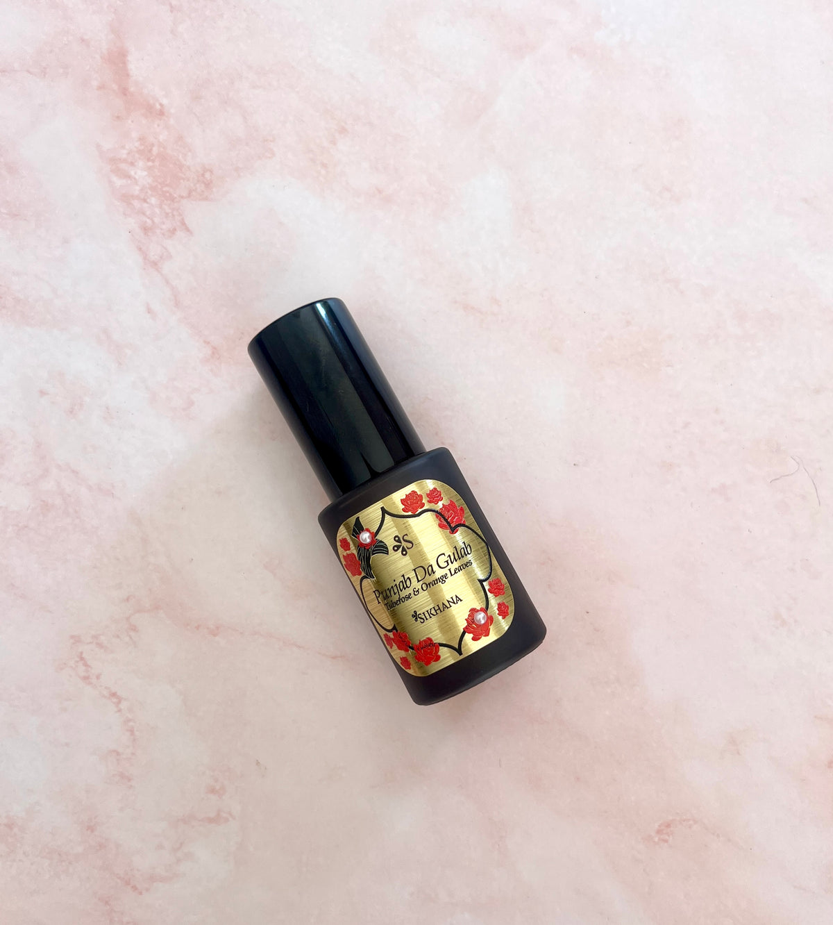 Sikhana Luxury Body Mist, 30ml, on pink marble, view 2