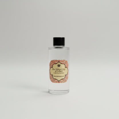 Small bottle with a label on a reflective surface