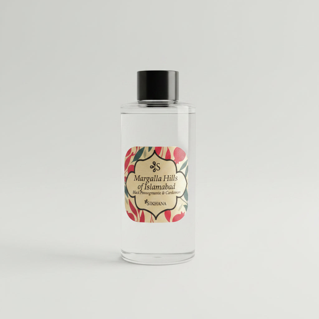 Small bottle with a decorative label on a textured surface