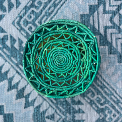 Top of green fruit basket made of date palm leaves by artisans in Sindh Pakistan