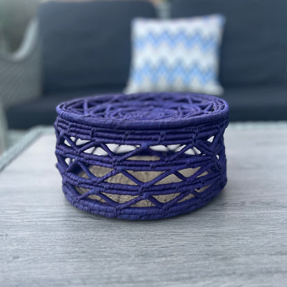 Blue fruit basket made from date palm leaves